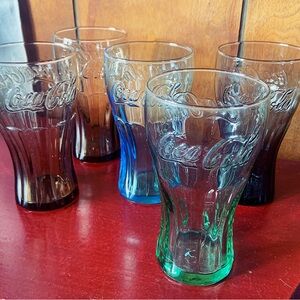 Coca Cola Glass Set with Green, Blue, and Brown Hues